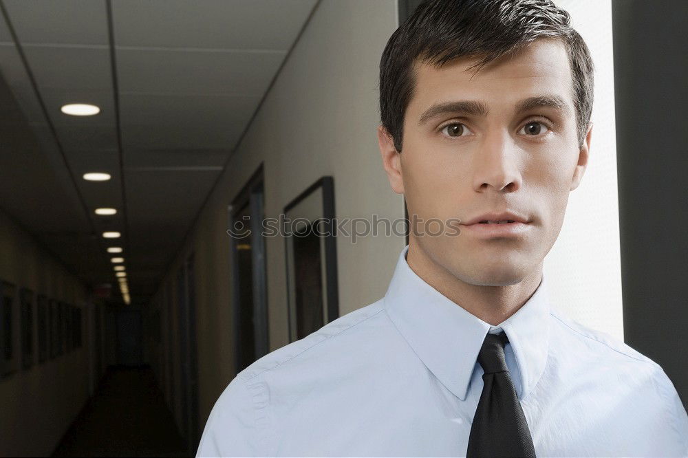 Similar – Image, Stock Photo young businessman in an office building