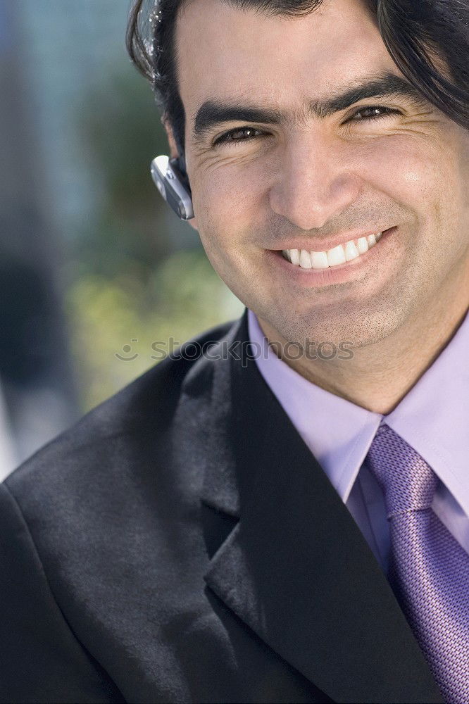 Similar – Businessman wearing blue suit and tie outdoors