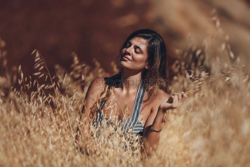 Similar – Image, Stock Photo Young beautiful woman in yellow dress talking with mobile phone