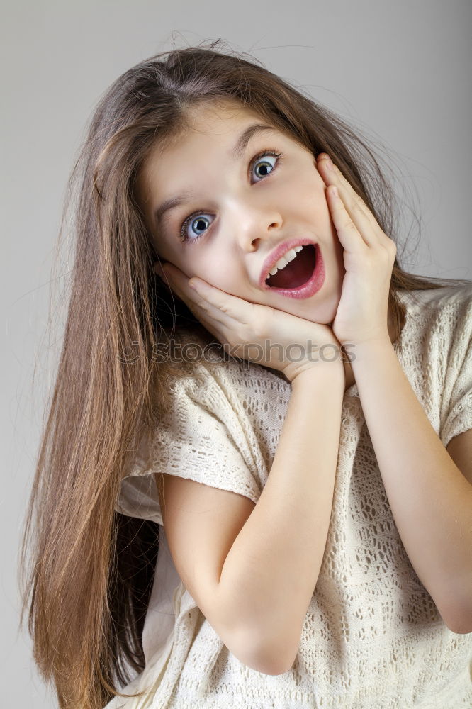 Similar – happy kid girl drinking tea for breakfast.