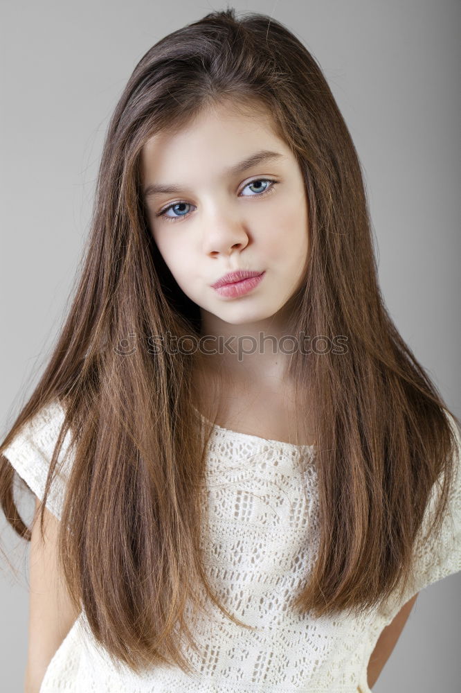 Similar – Image, Stock Photo woman peeking out from behind a sandstone pillar