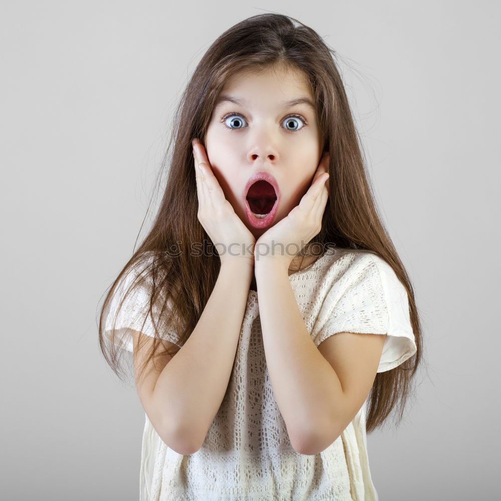 Similar – Amazed boy in light studio