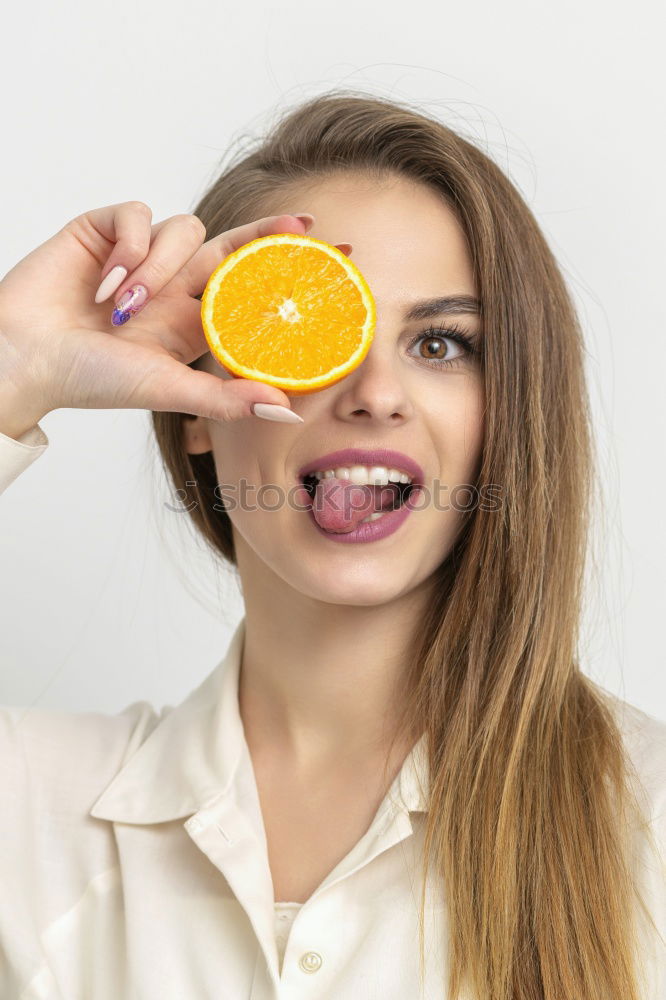 Similar – Image, Stock Photo Young woman eating lemon ice creams