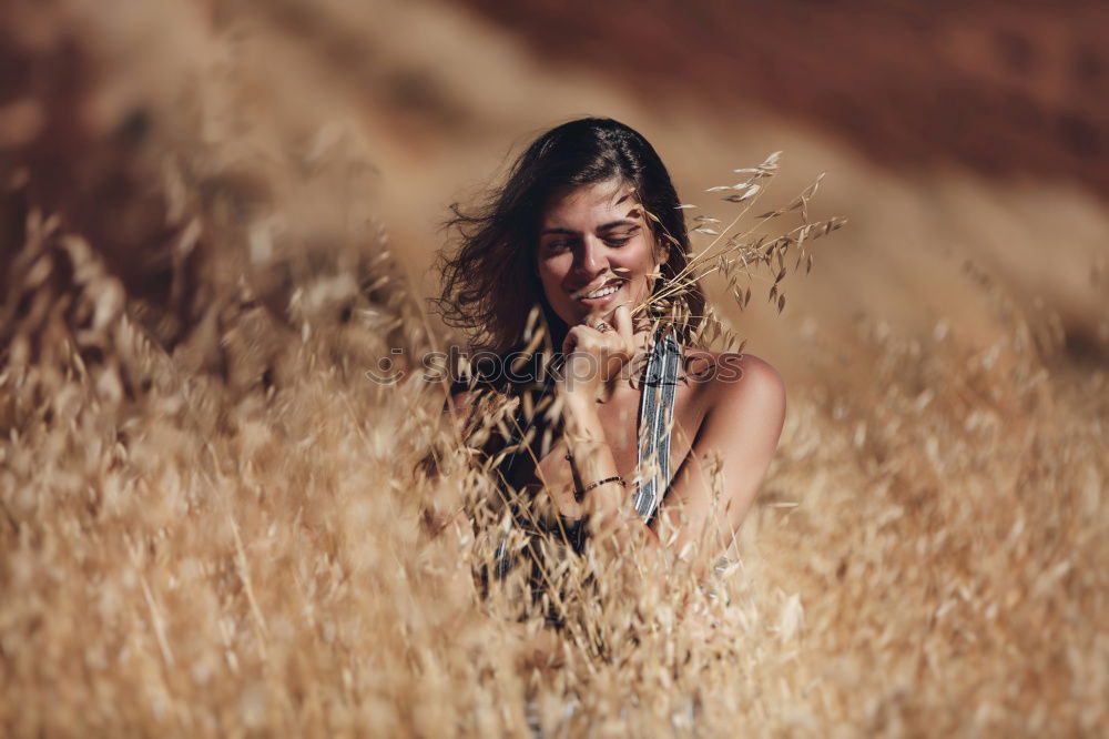 Similar – Image, Stock Photo Young beautiful woman in yellow dress taking pictures