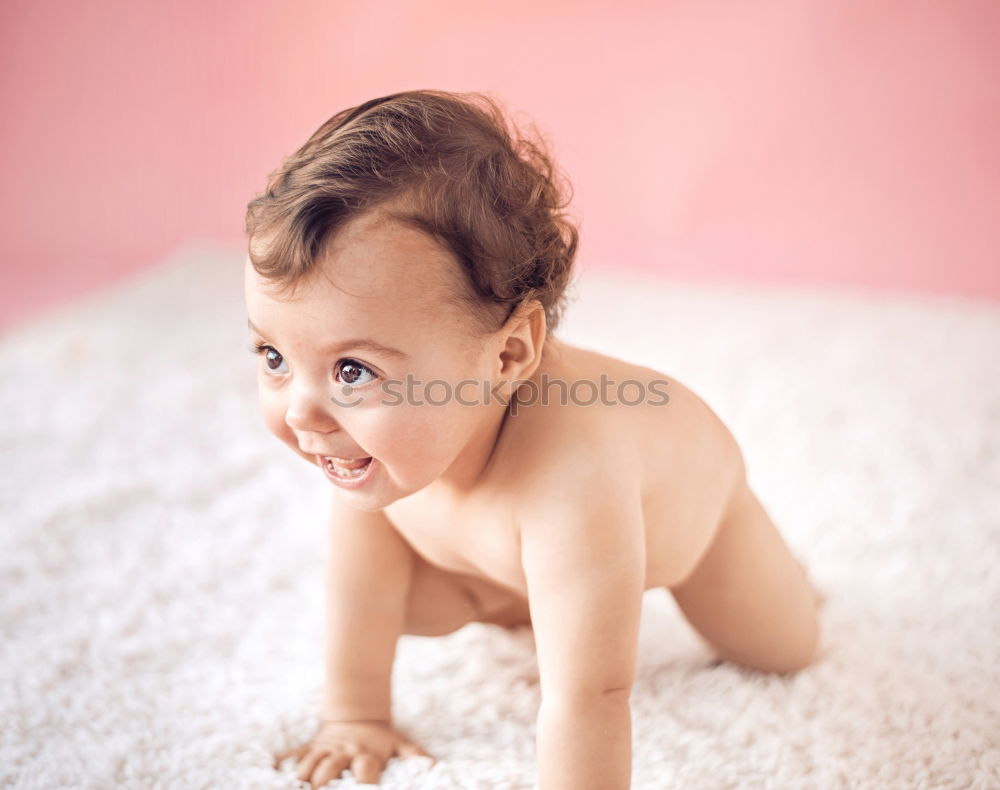 Similar – Little baby girl lying on blanket with colourful polka dots