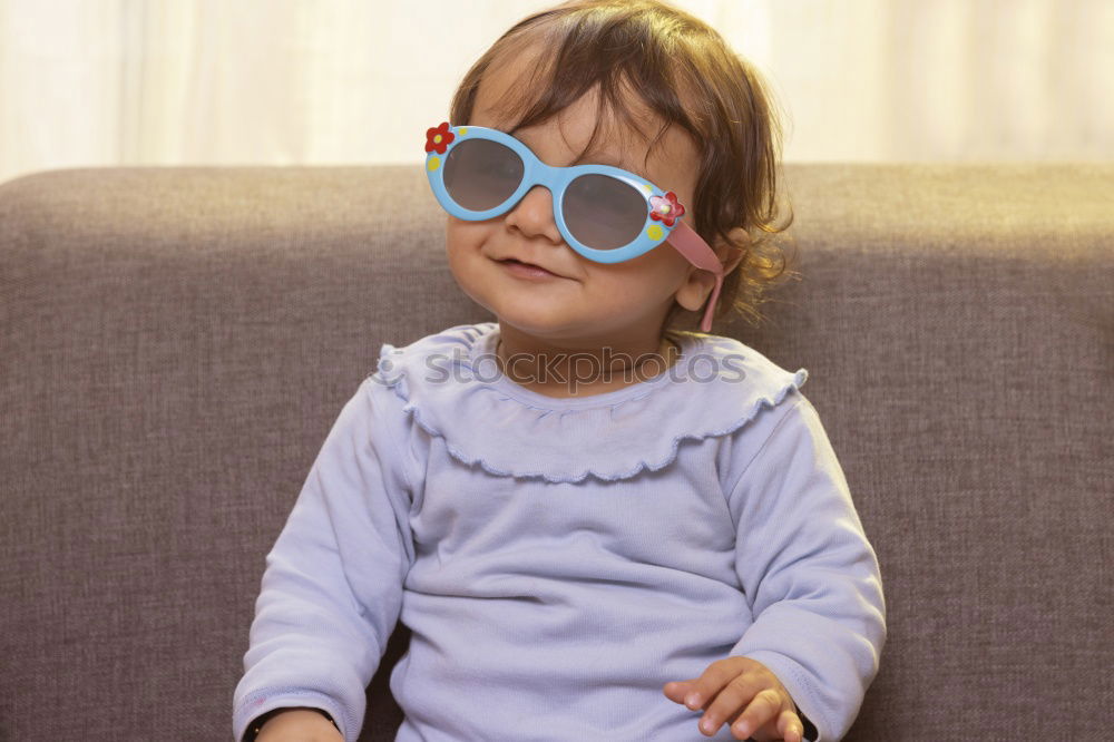 Similar – Funny boy smiling sitting inside a suitcase