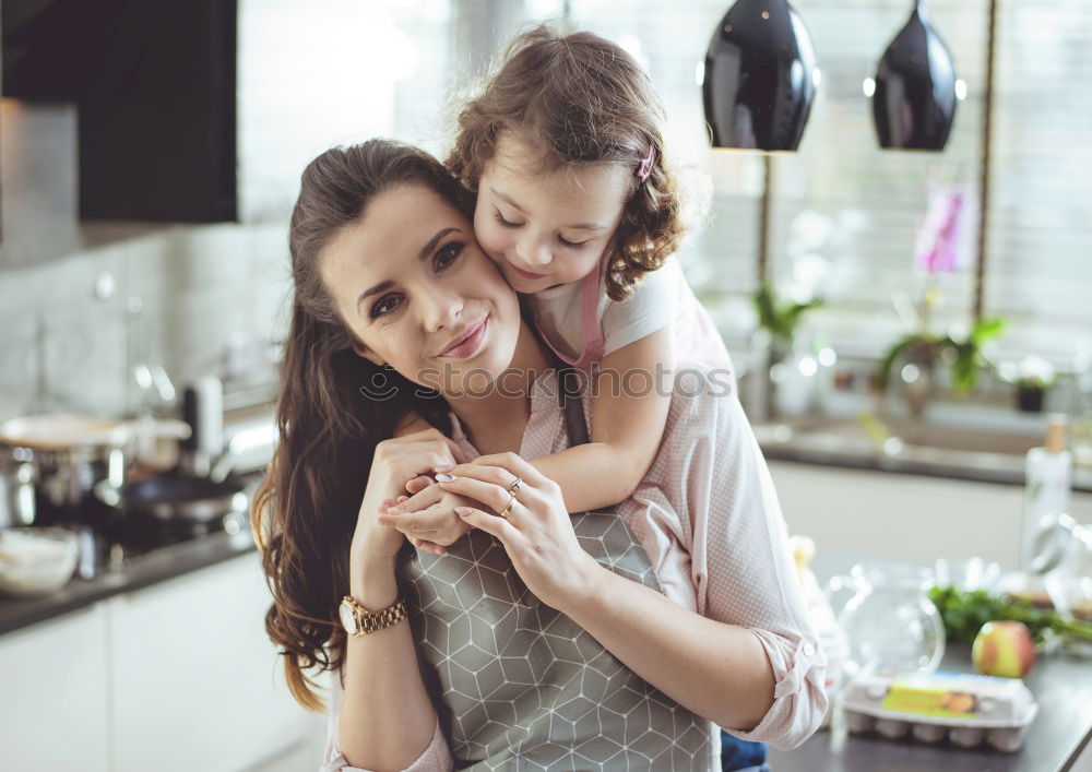 young happy mother comforting child son