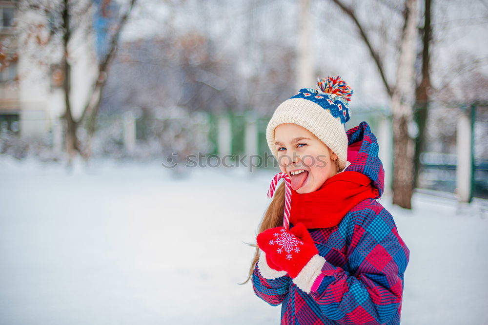 Similar – Image, Stock Photo Winter portrait of happy kid girl playing outdoor