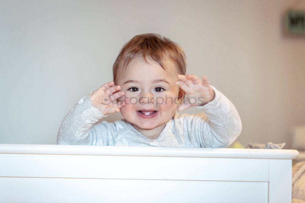 Similar – Image, Stock Photo 6 month old baby seated in high chair reaching into bowl of banana pieces; baby led weaning method