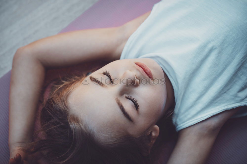 Smiling pretty woman on bed