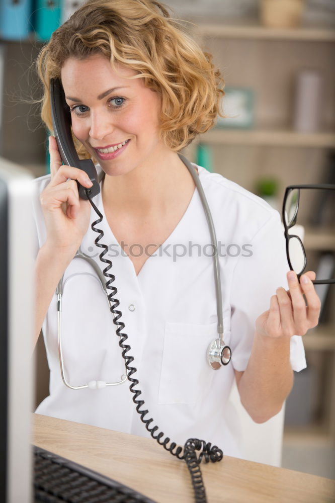 Similar – Image, Stock Photo Caregiver checking blood pressure to a senior woman