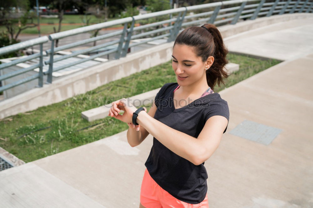 Image, Stock Photo Fit woman runner checking smartwatch outdoors