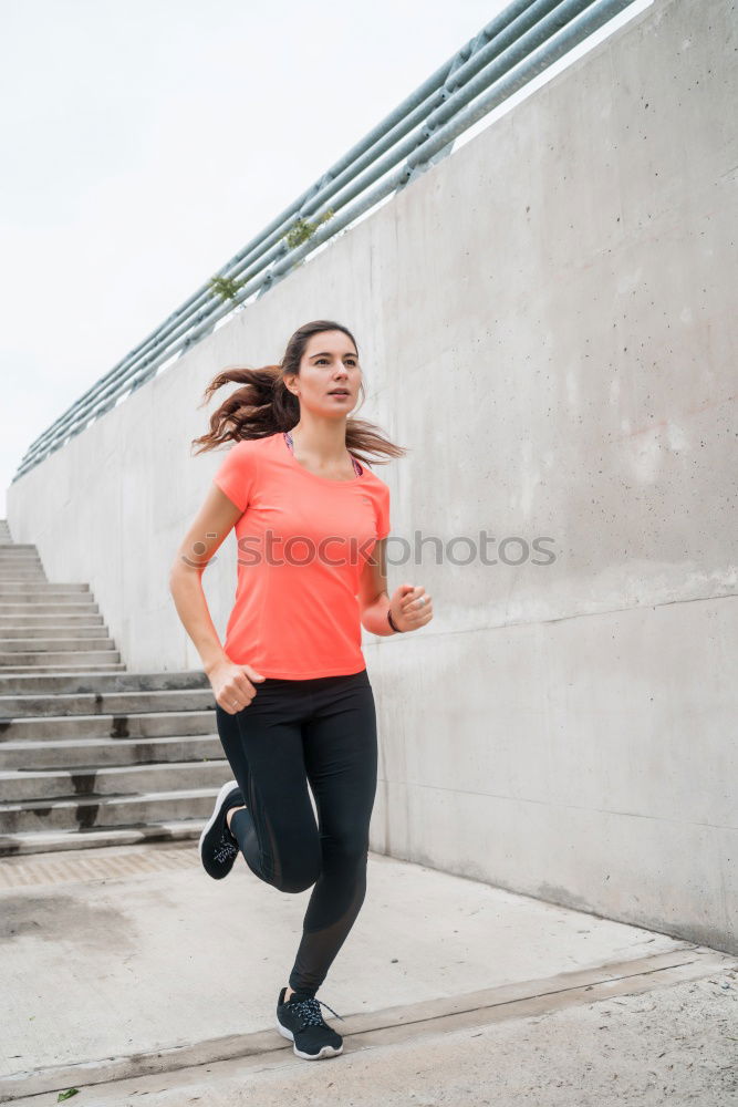 Similar – Image, Stock Photo Athletic woman running up stairs during cardio