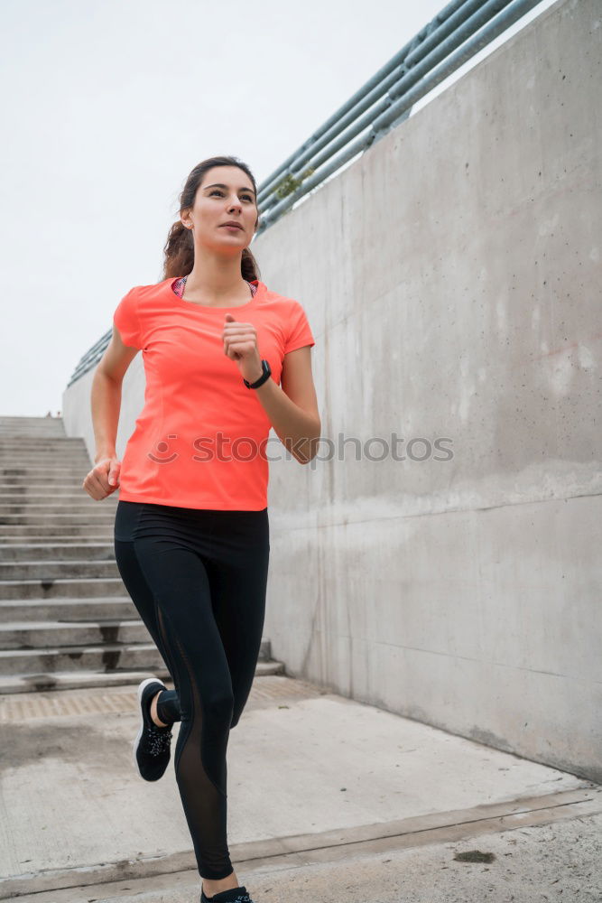 Similar – Young Woman working out outdoors and having fun