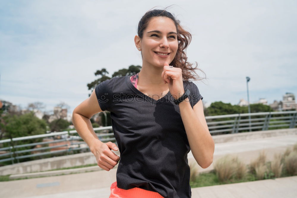 Similar – Image, Stock Photo Sportswoman doing leg stretches