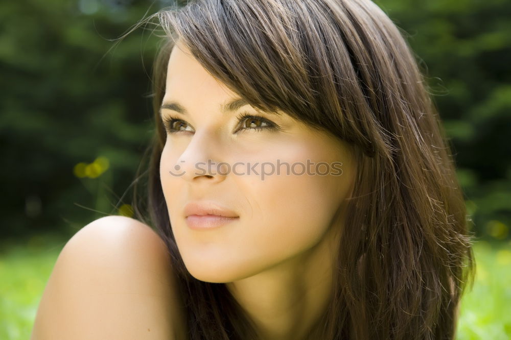 Similar – Beautiful brunette girl relaxing in the park