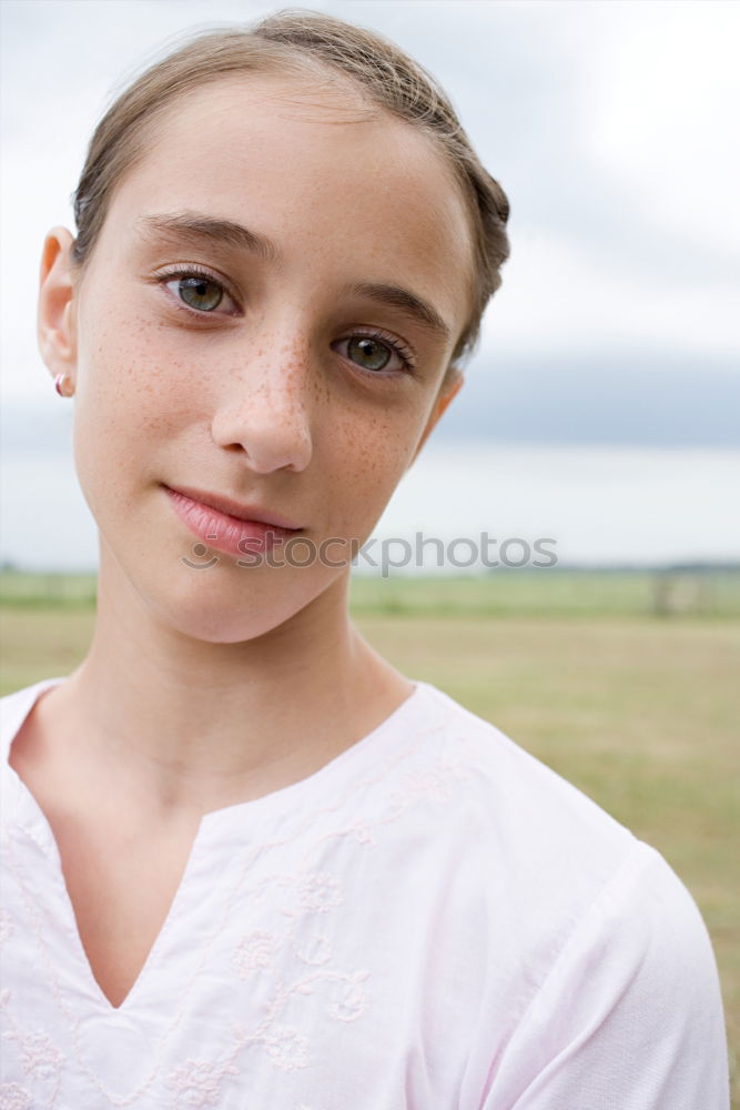 Similar – Portrait of a beautiful preteen girl with blue eyes