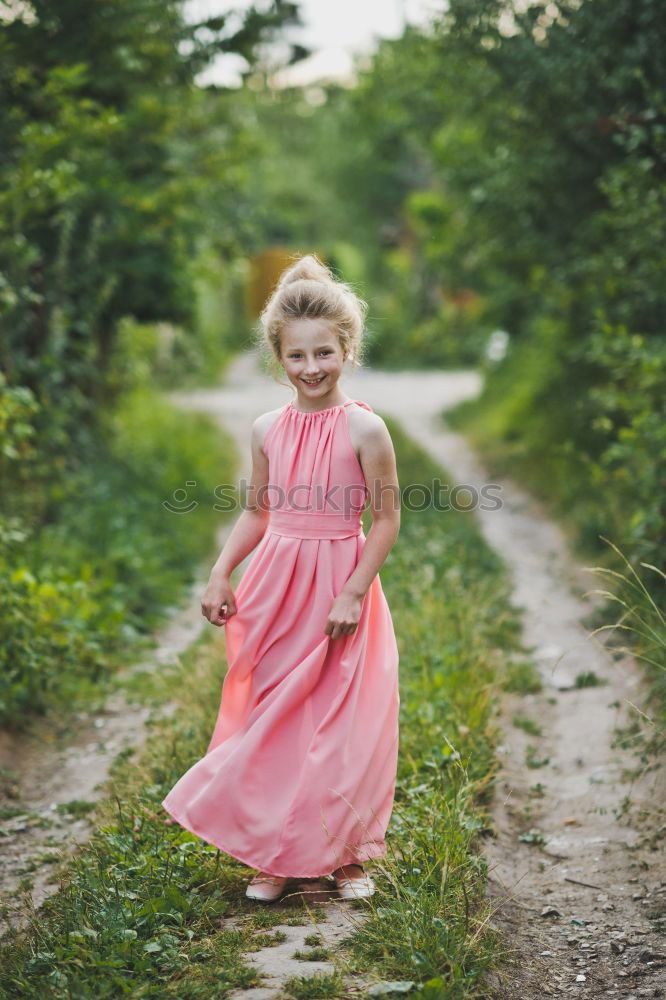 Similar – Image, Stock Photo Cute little girl having fun in a rural bridge