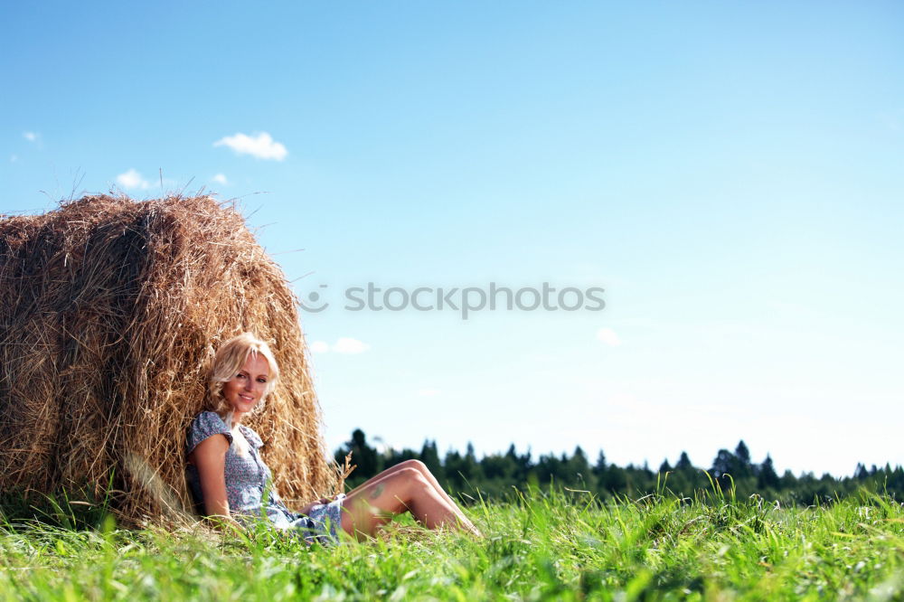 Similar – Image, Stock Photo Red haired woman laying in grass looking up