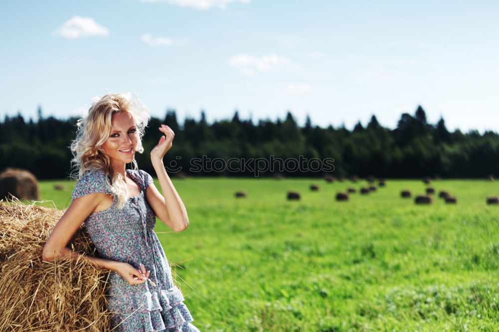 Similar – kid girl feeding calf on cow farm.