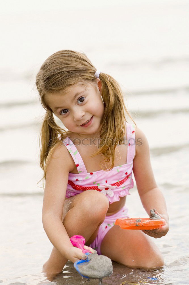 Similar – Image, Stock Photo child playing with sand