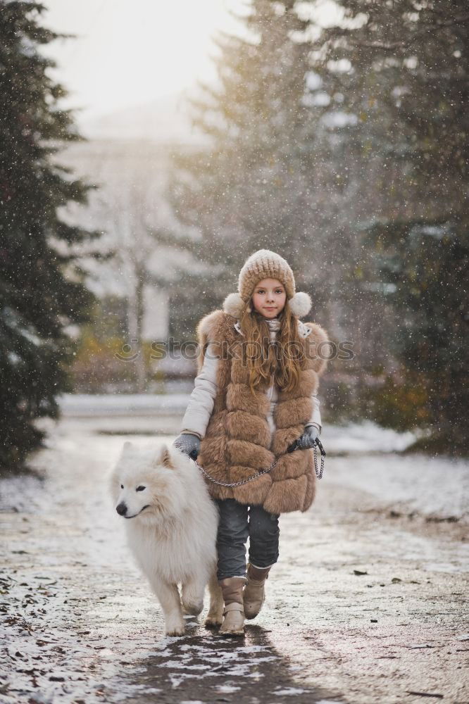 Similar – Image, Stock Photo Young woman is walking with her dog in the evening park.