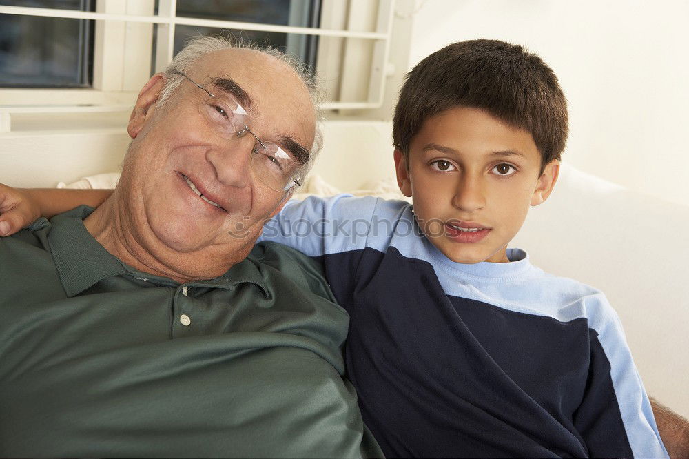 Similar – Portrait of grandfather and grandson embracing