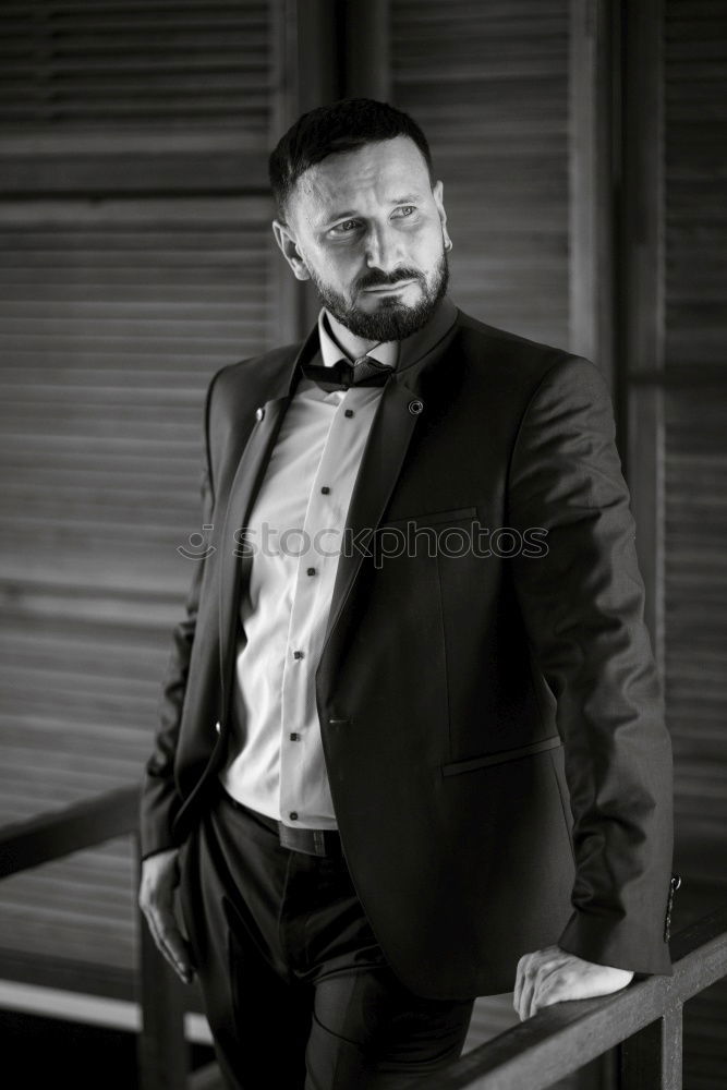Similar – Image, Stock Photo Young bearded man wearing british elegant suit