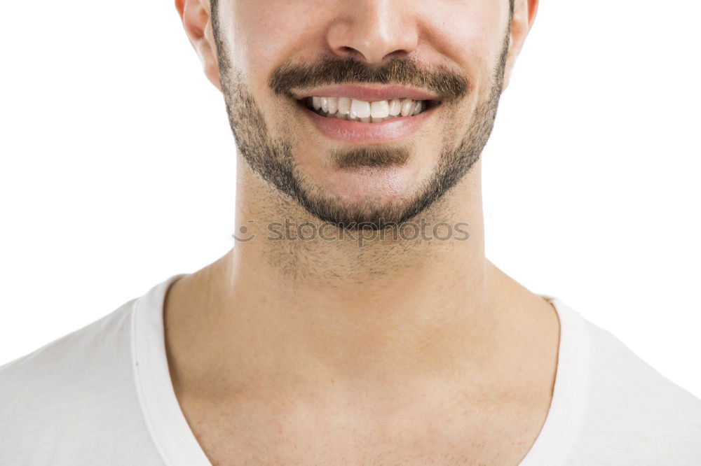 Young man smiling in urban background