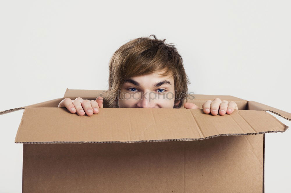 Similar – Moving boxes, Woman with boxes