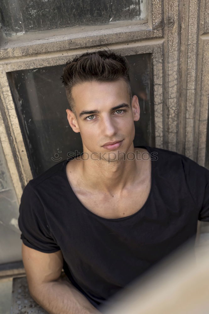 Similar – Image, Stock Photo Man leans against the wall and looks into the distance