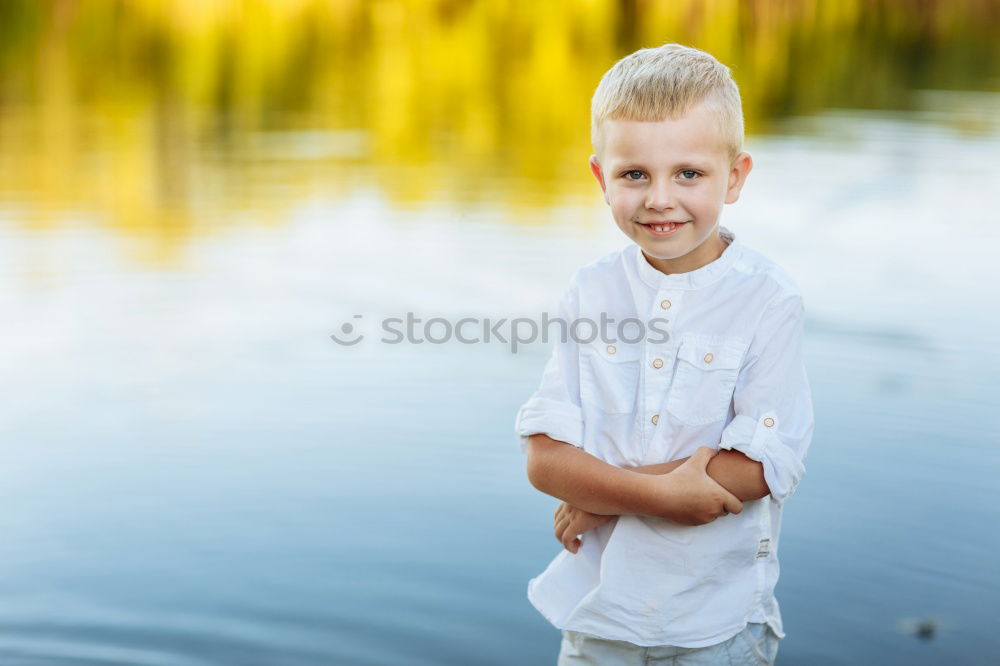 Similar – Image, Stock Photo Portrait of a little boy on a breakwater