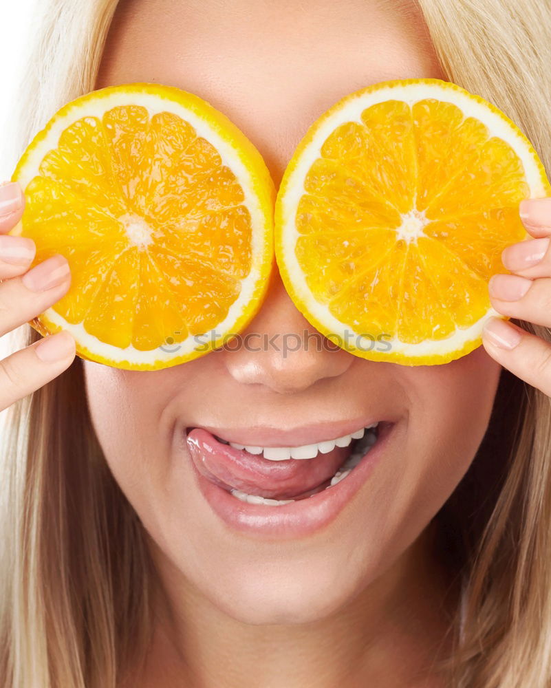 Similar – Smiling woman between slices of orange