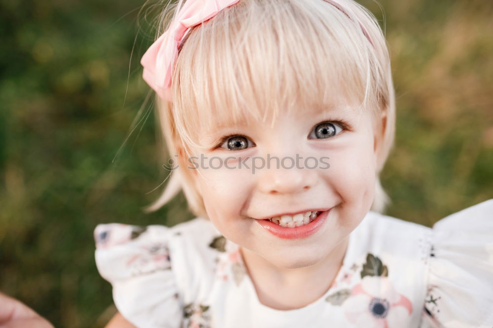 Similar – Image, Stock Photo Smiling girl between meadow with dry leaves