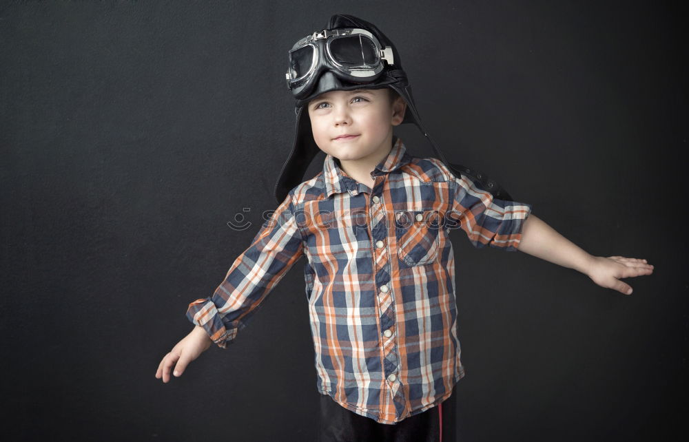 Similar – Child stands in a shower of confetti