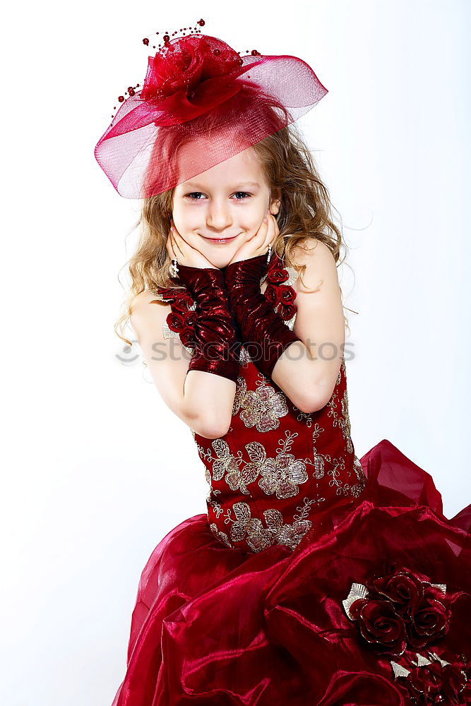 Similar – Image, Stock Photo Little playful, dreamy, pretty, beautiful, sweet, dressed up princess in pink, pink dress with tulle, stands at carnival, carnival as a spectator, visitors at the carnival procession in the street, on confetti and looks, watches, enjoys the party.