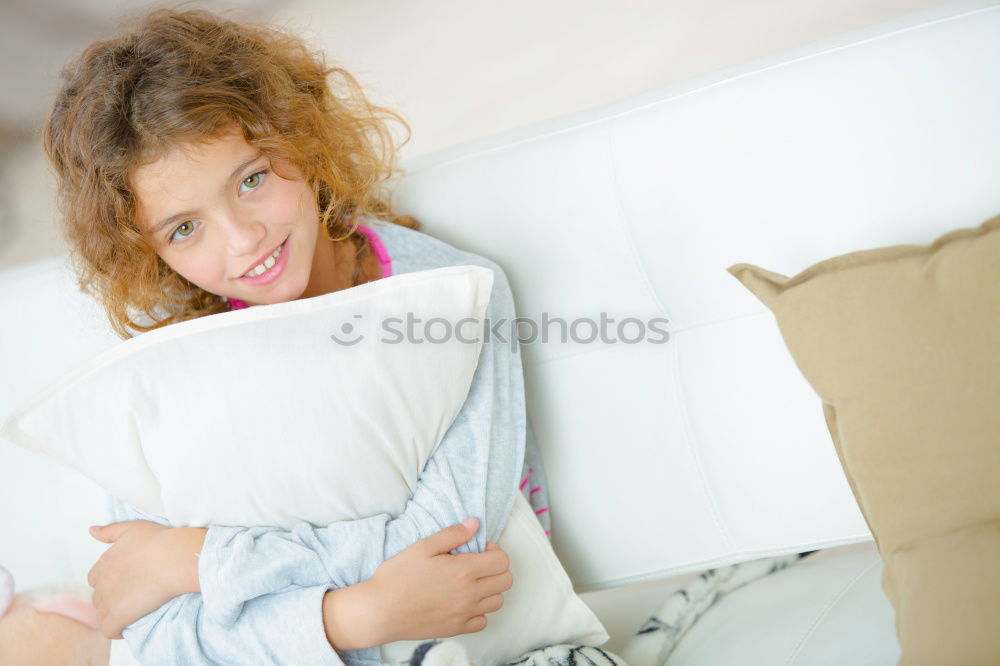 Similar – happy little child girl lying on her bed in the morning