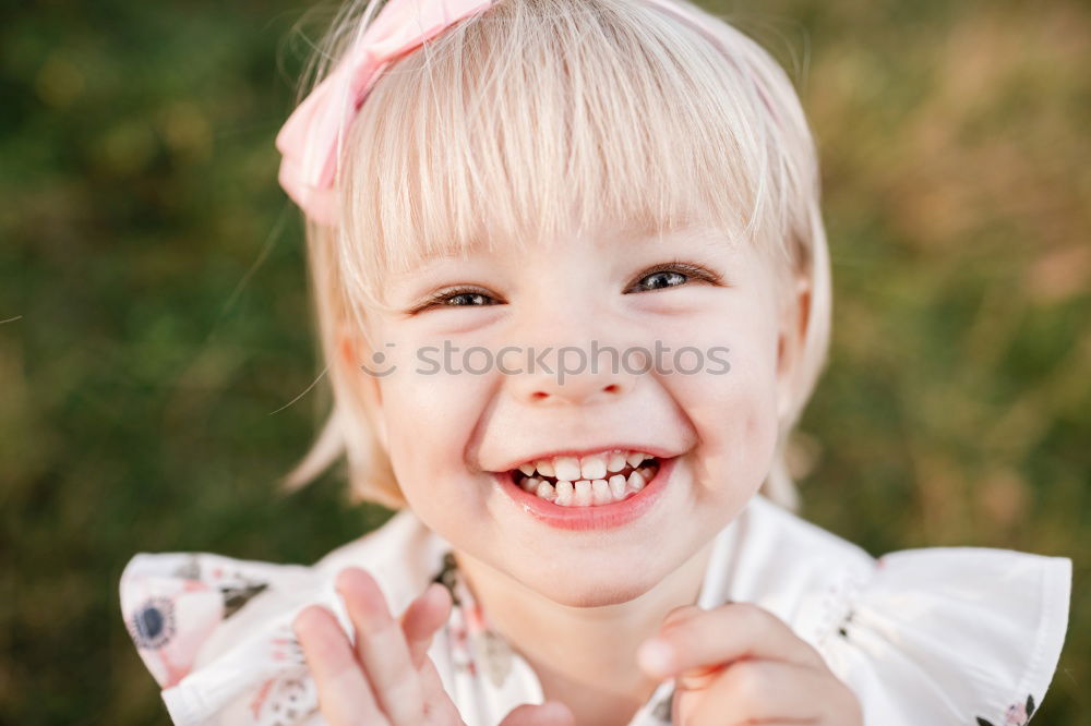 Similar – Image, Stock Photo Smiling girl between meadow with dry leaves