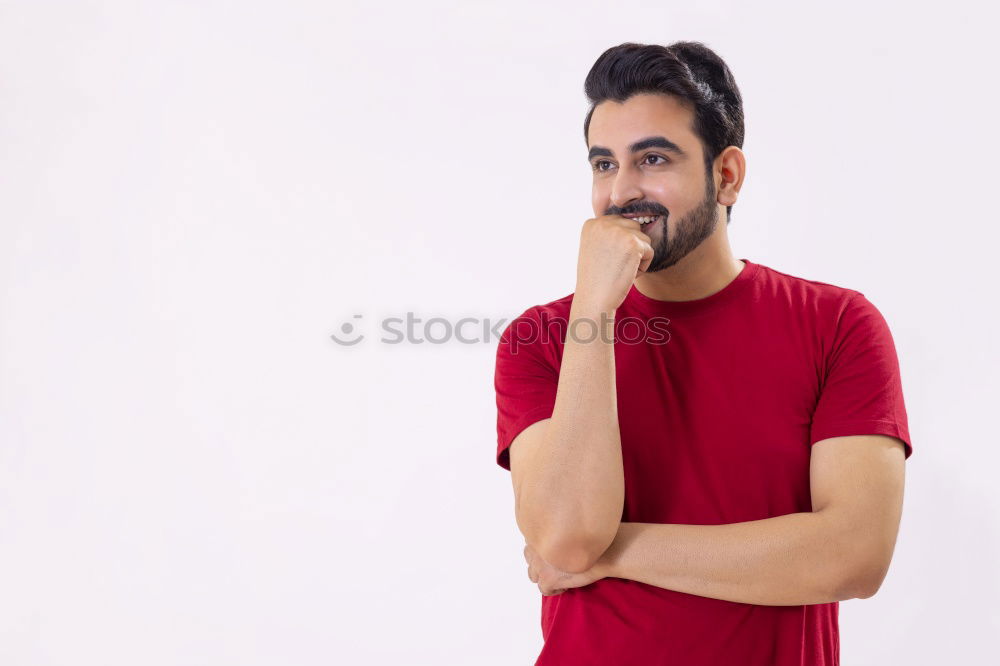 Playful man posing with fruit