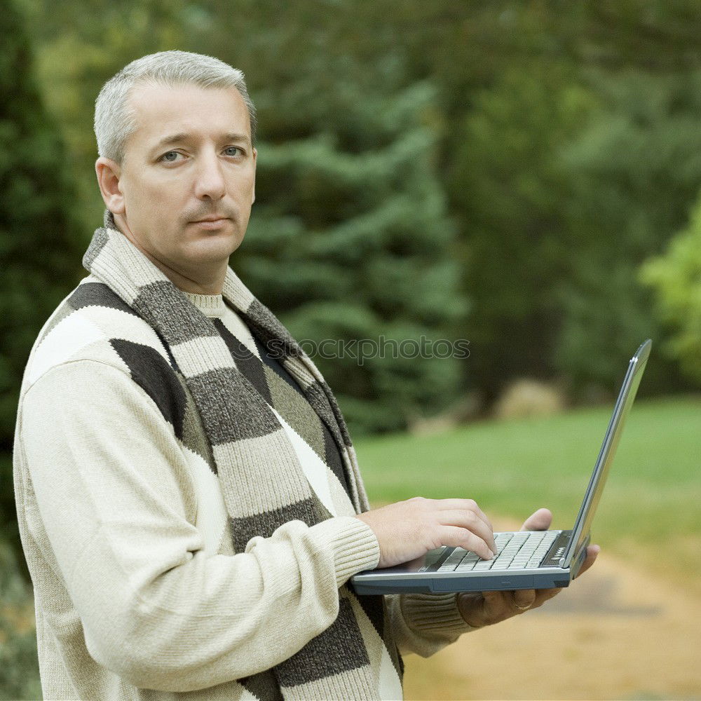 Similar – Image, Stock Photo Senior citizen with smartphone in the woods