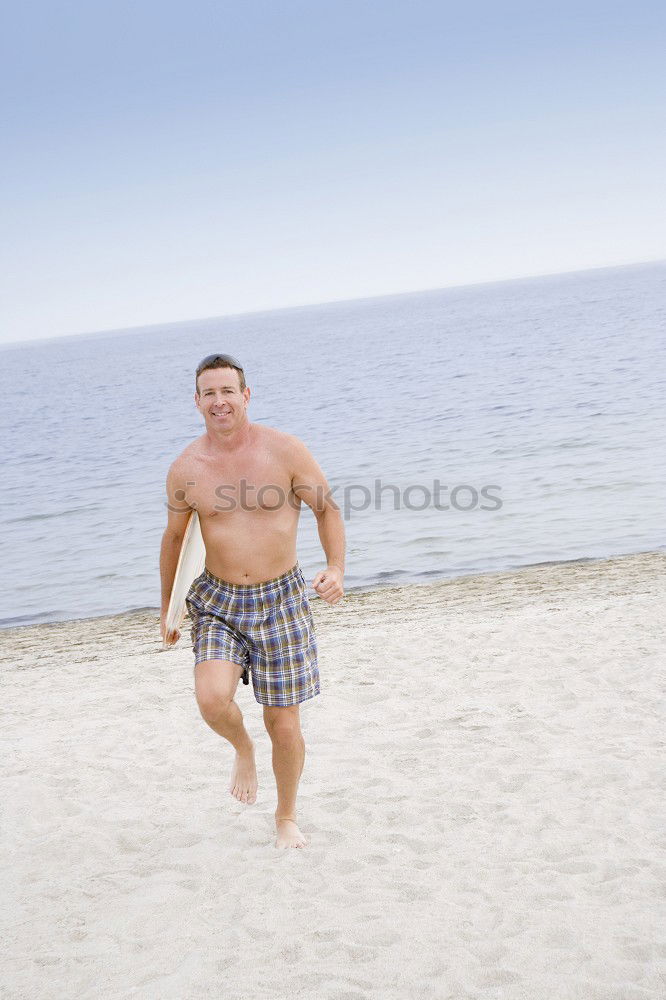 Similar – Young handsome man posing near a pool