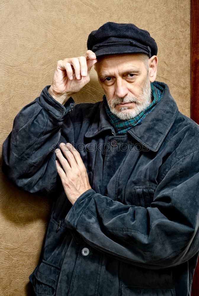 Similar – Portrait of a Man with Beard and a Cap