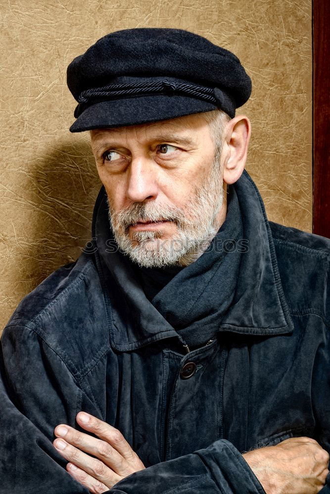 Similar – Portrait of a Man with Beard and a Cap