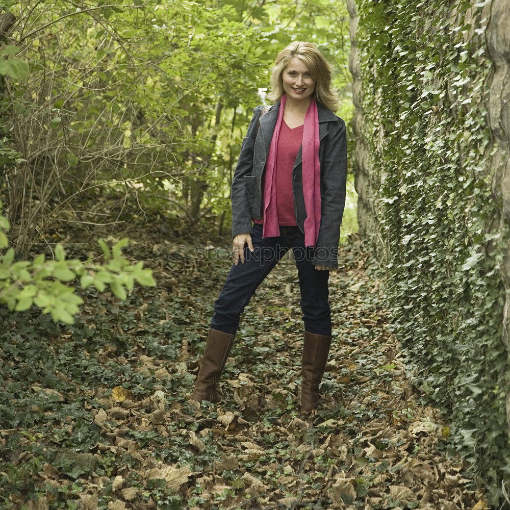 Similar – Image, Stock Photo young pregnant woman with long hair sits smiling on a tree trunk in the forest