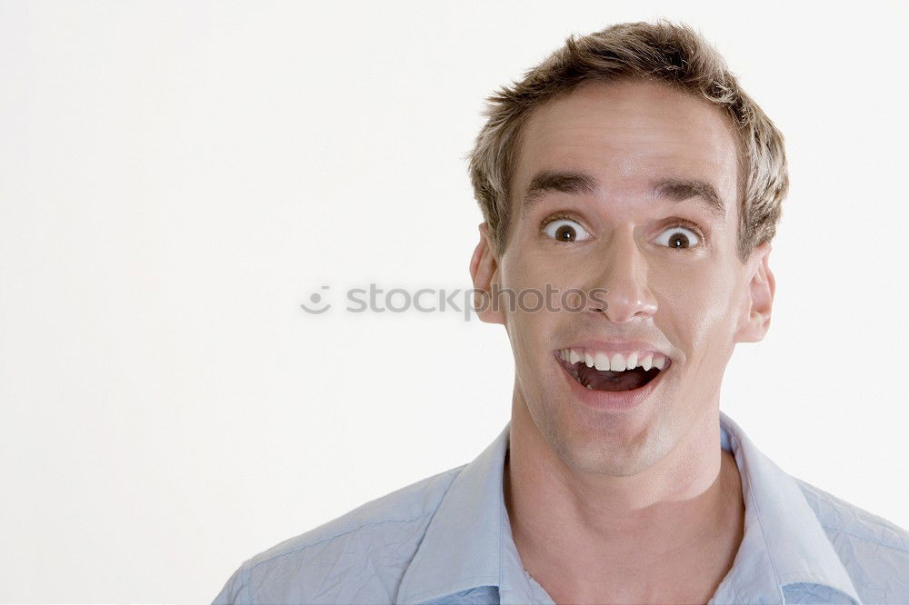 Similar – Young man eating a cotton candy in a fair