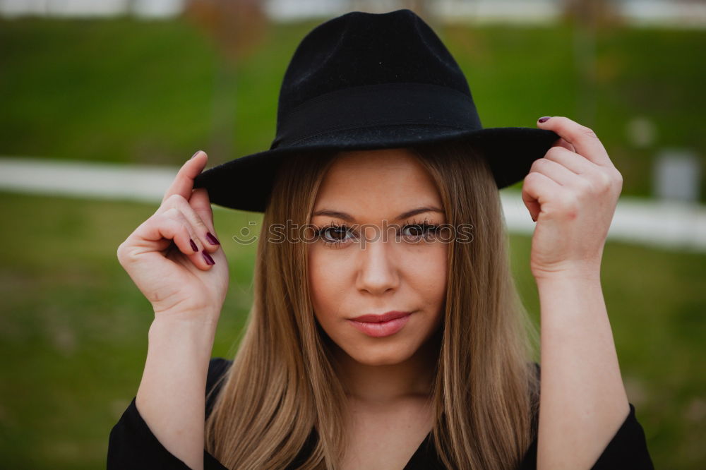 Similar – Beautiful young girl wearing beret standing in the street.