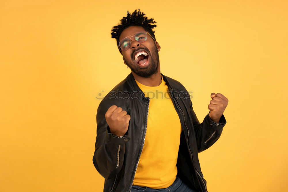 Similar – Image, Stock Photo Portrait of handsome afro man using his mobile.