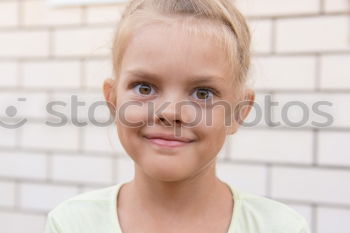 Similar – happy kid girl drinking tea for breakfast.