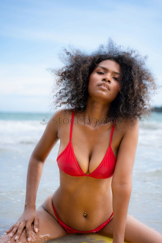 Similar – Beautiful young woman posing on the sand in a desert dunes