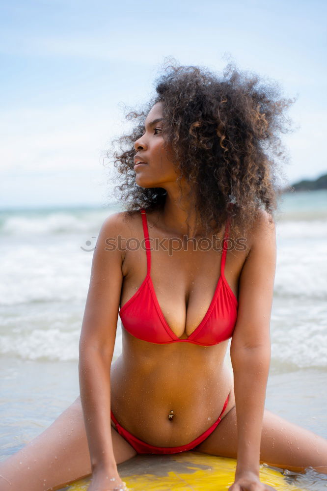 Similar – Beautiful young woman posing on the sand in a desert dunes